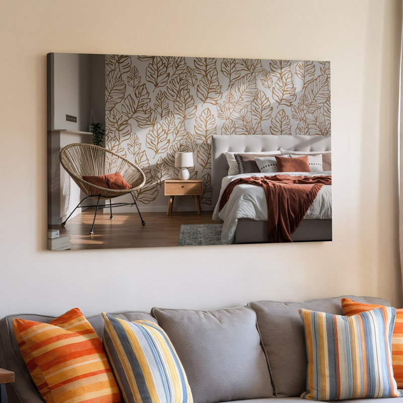 Toile une scène de chambre à coucher moderne et sereine avec un art mural texturé orné de grands motifs de feuilles élégantes