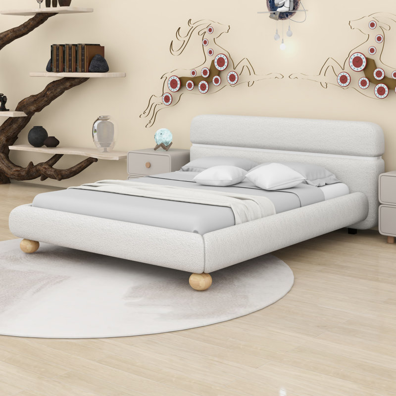 Lit contemporain tapissier à profil bas avec tissu en molleton Teddy et pieds ronds massifs, conception élégante en forme de courbe pour la chambre à coucher