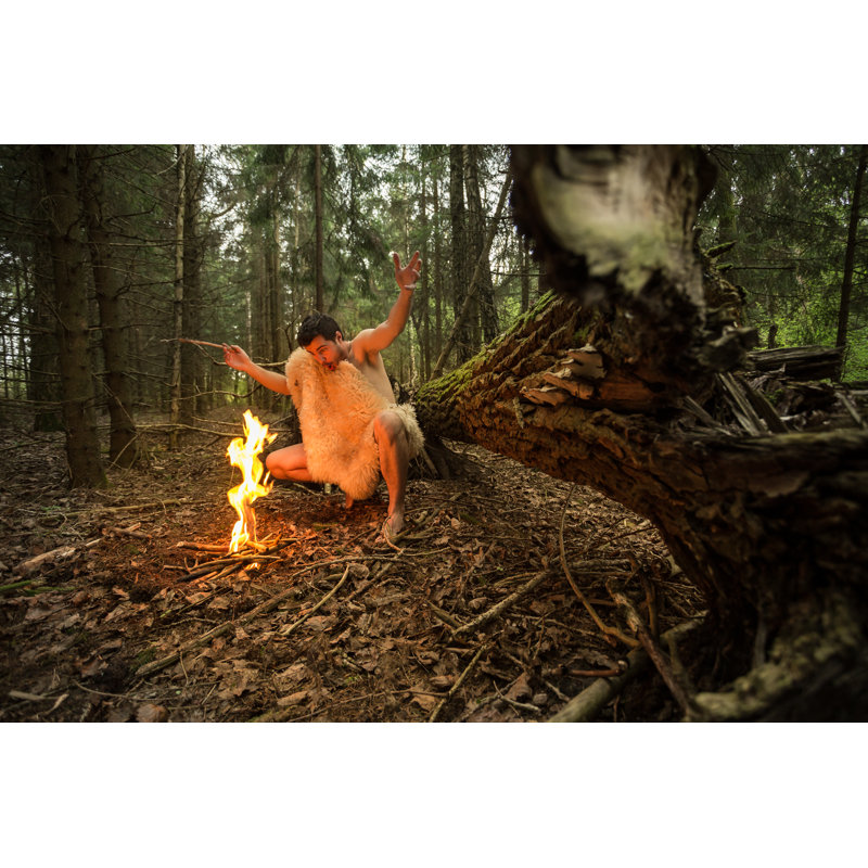 Caveman In Animal Skin Kindles A Fire In The Forest - Wrapped Canvas Print, 30cm H x 46cm W x 3.8cm D
