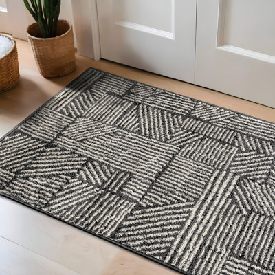 Tapis géométrique noir / ivoire Rambo