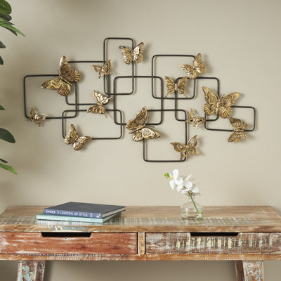 Décoration murale papillon Asinat en métal doré avec rectangles noirs ouverts