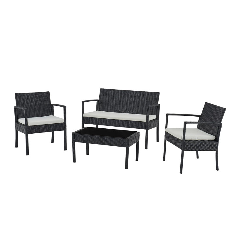 Soffren 4 - Person Wicker Patio Dining Set with Rectangular Table , Cushions Included, Black