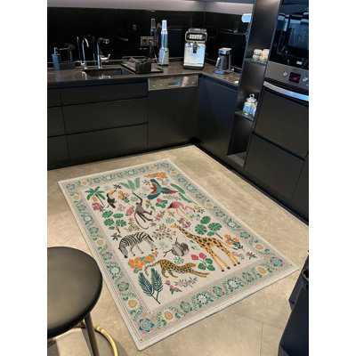 Tapis tissé à motifs botaniques et mignons