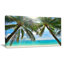 Palmier suspendu sur une plage de sable blanc - reproduction de photo sur toile tendue-590073792-603073661