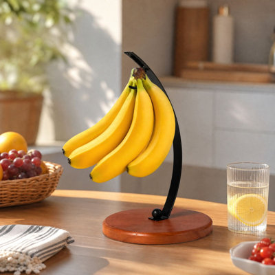 Panier tressé en rotin avec base en bois pour suspendre les bananes et conserver les fruits.