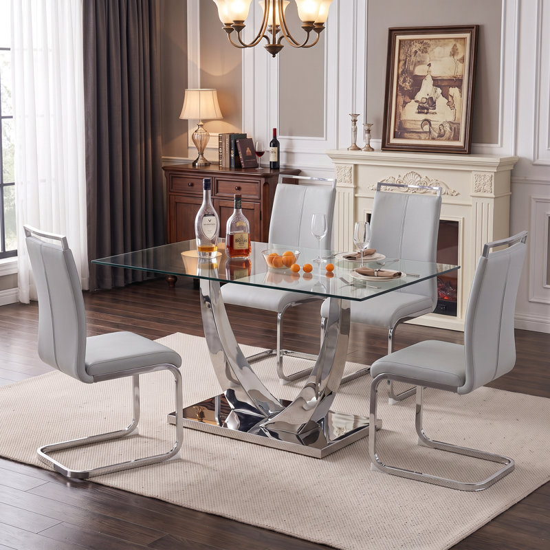 Ensemble de salle à manger 5 pièces rectangulaire moderne en verre trempé avec base en métal et chaises en porte-à-faux en similicuir