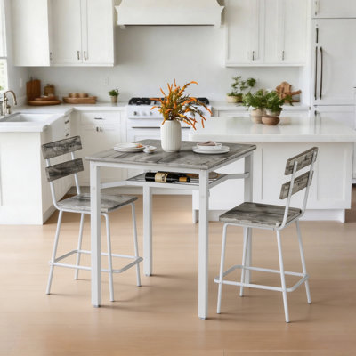 Ensemble de salle à manger 3 pièces de style moderne, ensemble de salle à manger peu encombrant pour la cuisine, la salle à manger, le petit espace, un petit ensemble de 3 tables de bar avec plateau en particules, structure en métal et support de rangement intégré
