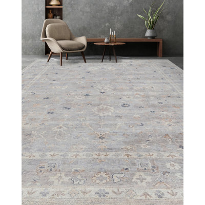 Tapis oriental rectangulaire en laine noué à la main bleu / crème / gris