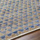 Addy Geometric Handmade Flatweave Recycled P.E.T. Area Rug in Blue/Tan