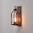 1-light Outdoor Wall Sconce With Cylindrical Seeded Glass