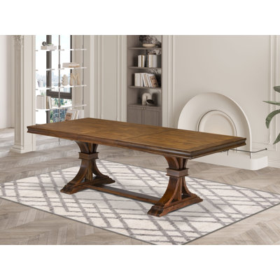 Une table de salle à manger en bois avec plateau rectangulaire amovible