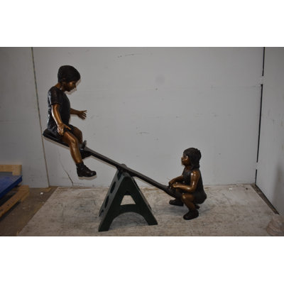 Playful Children on a See-Saw Bronze Statue Size: 76" x 27" x 59"H