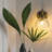 Modern 1-Light Gold Wall Sconce with Spiraled Ribbed Glass