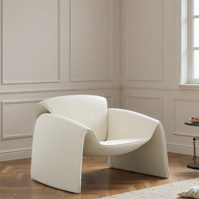 Fauteuil de loisir simple crème clair.