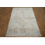 Tapis blanc artistique avec motifs géométriques complexes 5 x 8
