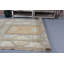Tapis turc exceptionnel avec des motifs géométriques complexes et des tons de terre doux, idéal pour rehausser l'élégance de votre décor
