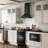 ZLINE 24" Convertible Wall Mount Range Hood in Black Stainless Steel with Set of 2 Charcoal Filters, LED lighting and Dishwasher-Safe Baffle Filters (BSKBN-CF-24)