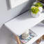 Console avec trois tablettes ouvertes Botwinick-865091598