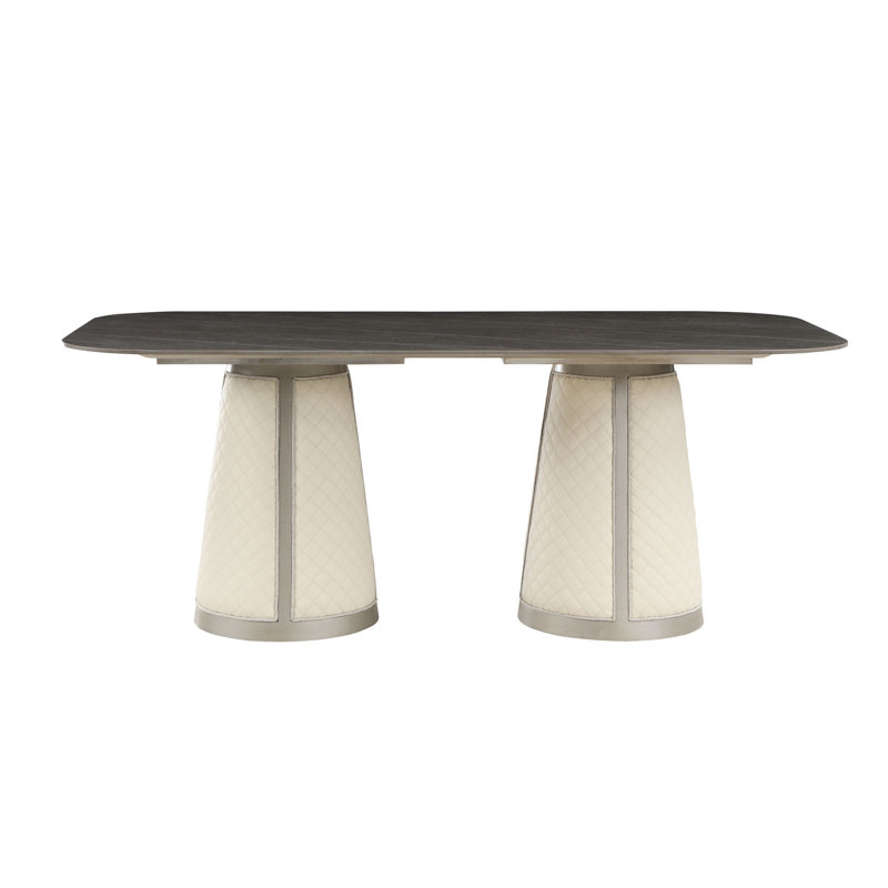 Table de salle à manger à finition champagne avec plateau en pierre frittée et base en bois composite