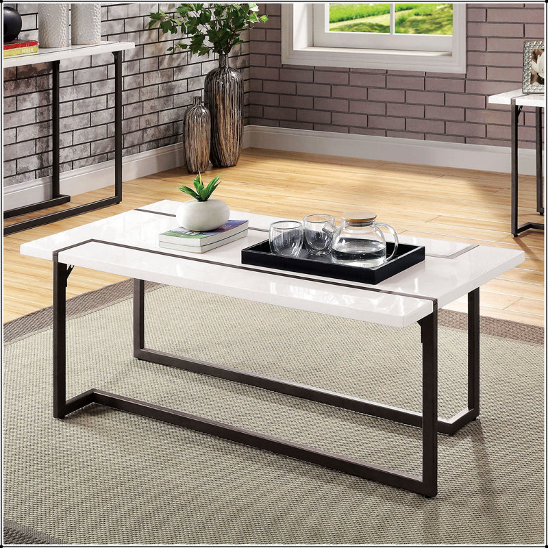 Table basse moderne et moderne avec pieds en métal extensibles et plateau laqué ultrabrillant pour des espaces de vie élégants