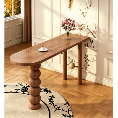 Table de bar haute avec plateau ovale et pieds sculpturaux en forme de boules empilées
