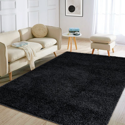 Tapis rectangulaire noir uni en polypropylène tressé à la machine