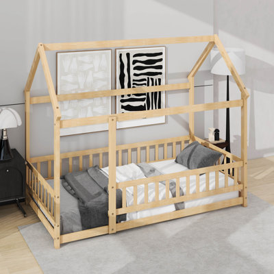 Lit simple en bois avec clôture