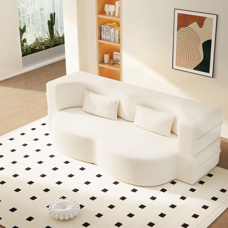 Canapé moderne avec fonction convertible, tissu en peluche rembourré de mousse et matelas pliant simple pour espaces polyvalents.