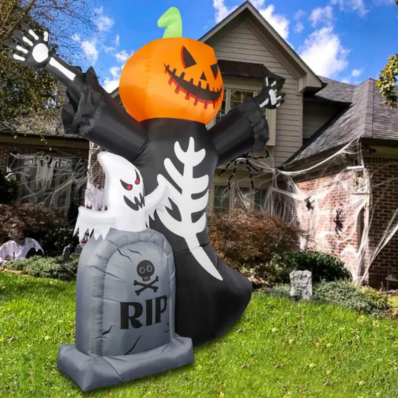 The Holiday Aisle Inflatable Pumpkin and Tombstone