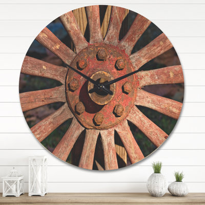 Horloge murale en bois rouge