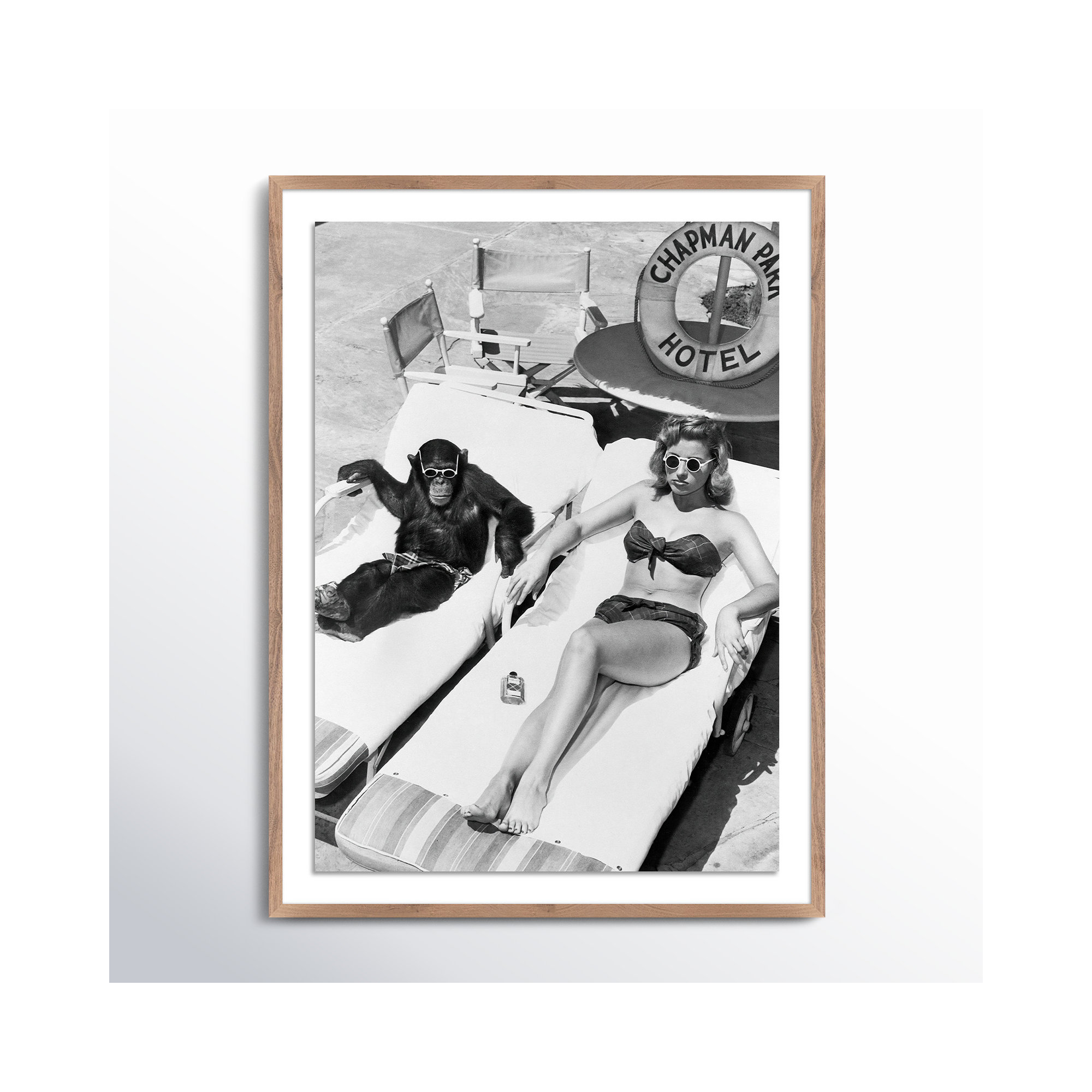 Woman Sunbathing With Chimpanzee by Getty Images, 24" H x 18" W, Rustic Walnut Framed