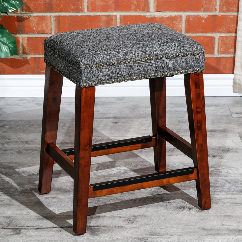 Élégant tabouret de comptoir de 24 po sans dossier avec des pieds au design classique et un rembourrage de siège confortable