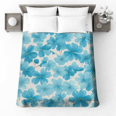 Couvre-lit matelassé bleu à motif floral