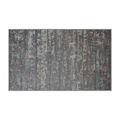 Tapis gris soyeux et moelleux