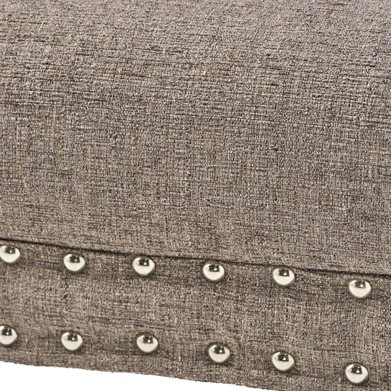 Élégant banc gris avec texture et repose-pieds évasés