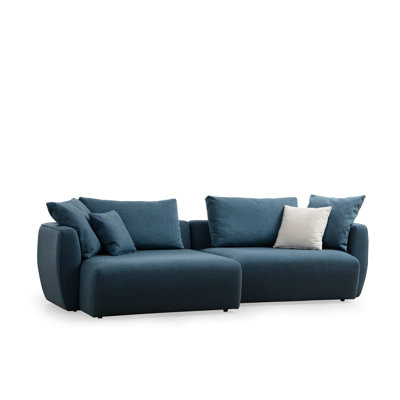Canapé d'angle élégant Jernigan, tissu bleu, 100% polyester | Dimensions: 100,4 po x 50,0 po x 25,6 po | Structure en bois de hêtre et en bois aggloméré, 28 couches de mousse pour plus de confort | Tissu nettoyable à sec, coussin de dossier portabl
