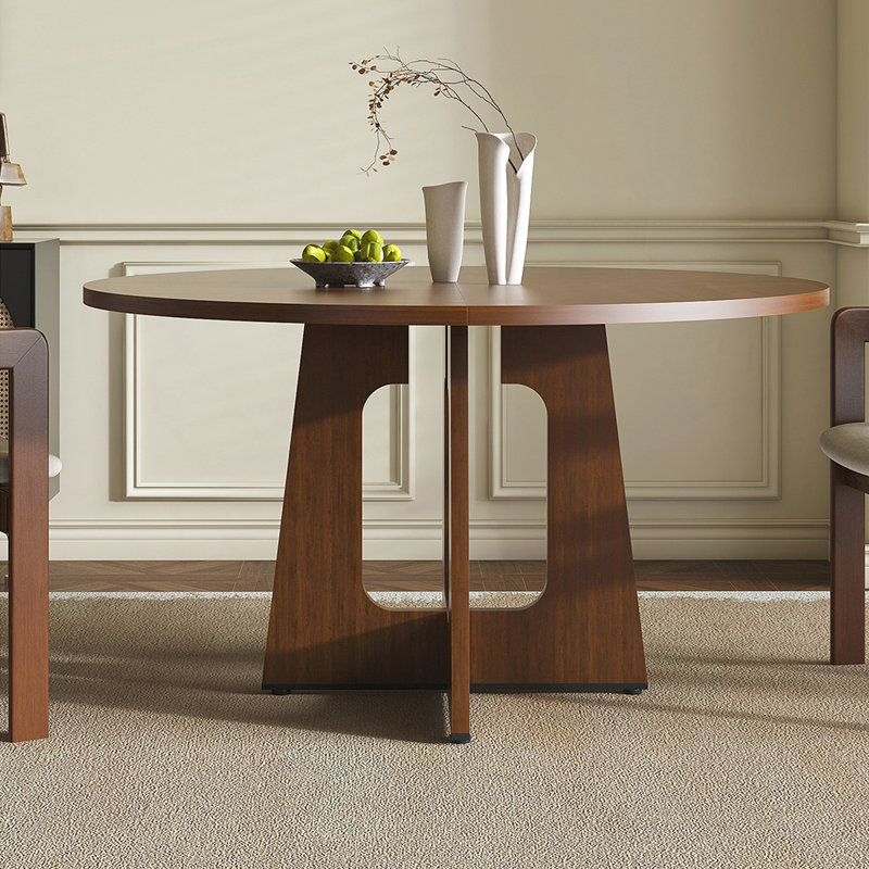 Table de salle à manger ronde durable avec surface spacieuse et repose-pieds réglables, parfaite pour les réunions de famille et l'utilisation quotidienne.