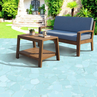 Sturdy Outdoor Acacia Patio Dining Set With Gray Wood And Blue Cushions, Ideal For Modern Entertaining