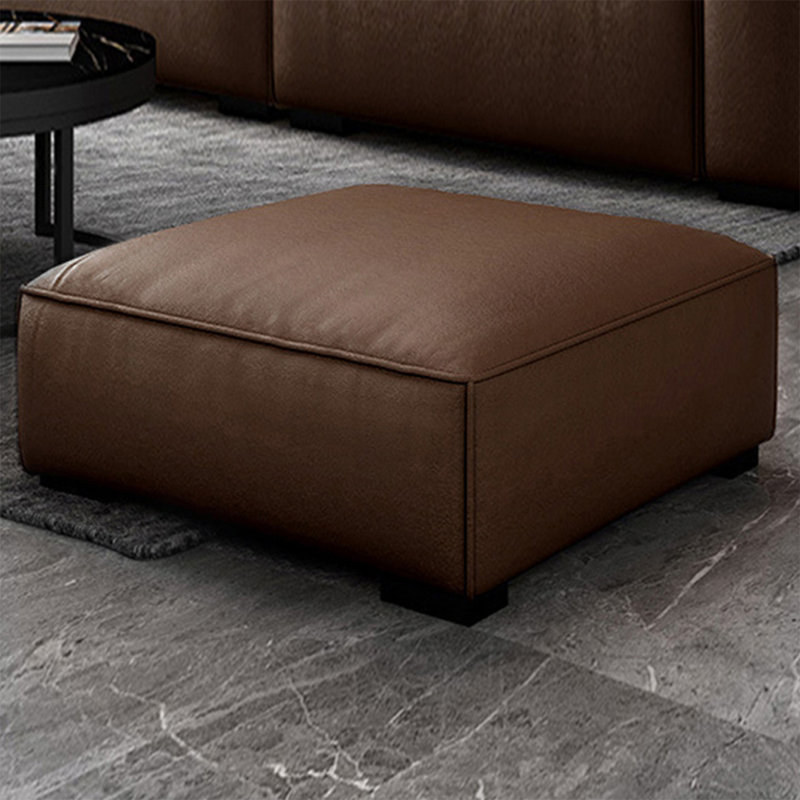 Repose-pieds brun en cuir véritable avec coussin