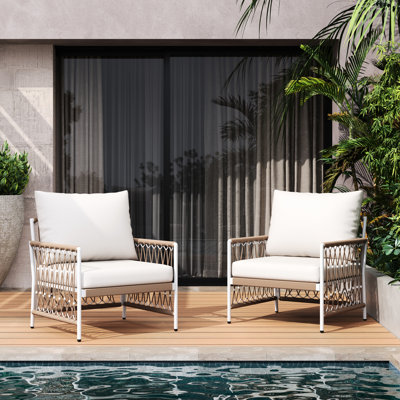 De 2 chaises longues bohémiennes pour l'extérieur avec corde tissée à la main, structure en acier thermolaqué et coussins imperméables. Support confortable, résistant aux intempéries et élégant. 25,99 po de hauteur, 26,47 de profondeur, 27,44 po