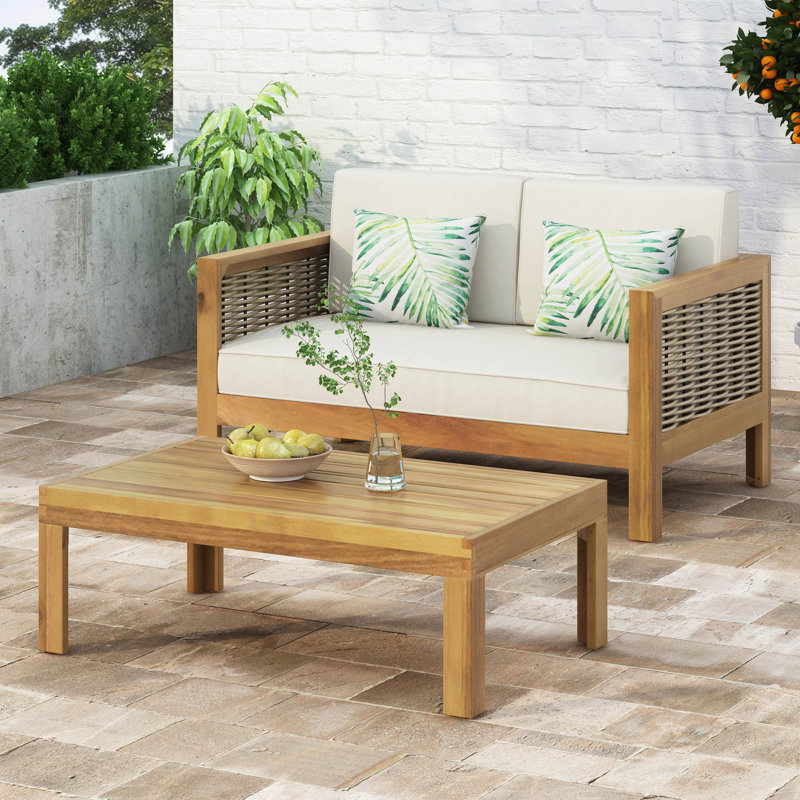 Ensemble de causeuse et table basse d'extérieur en bois d'acacia et osier avec coussins, teck et beige