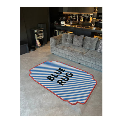 Tapis bleu tissé à rayures Mosso