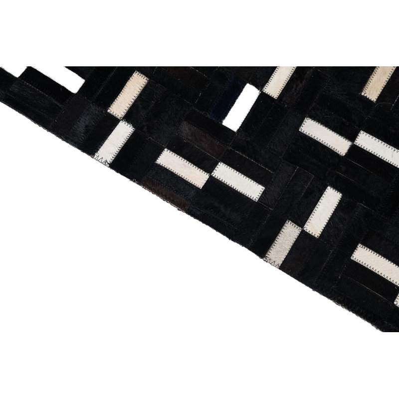 Tapis noir Isidore