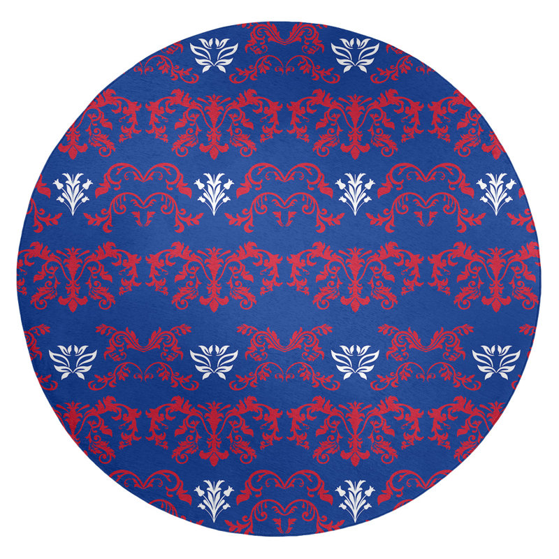 Tapis rond bleu damassé à motif baroque