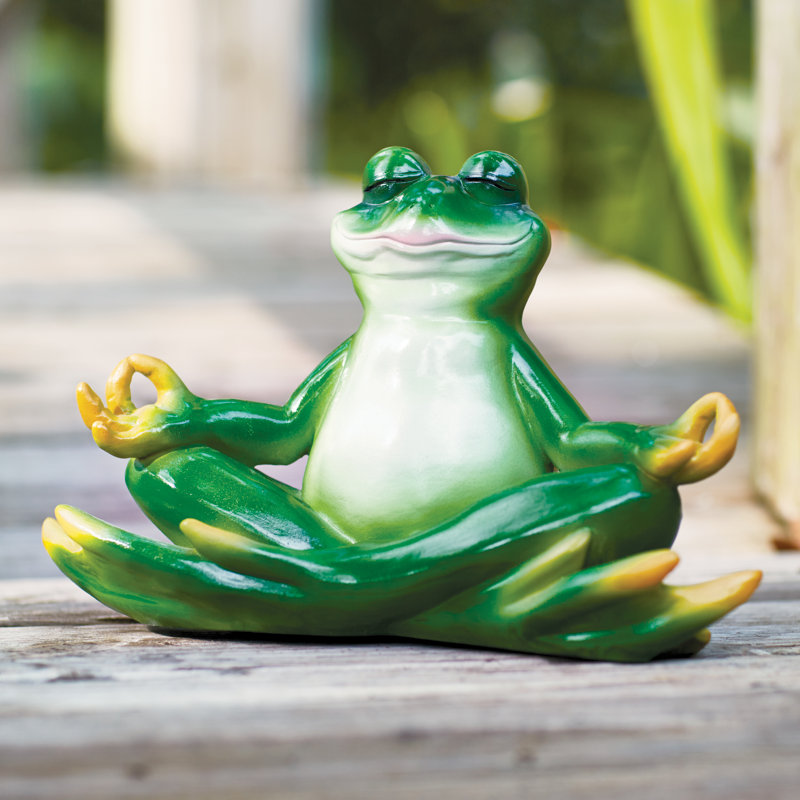 Statue de grenouille zen yoga qui prends la pose