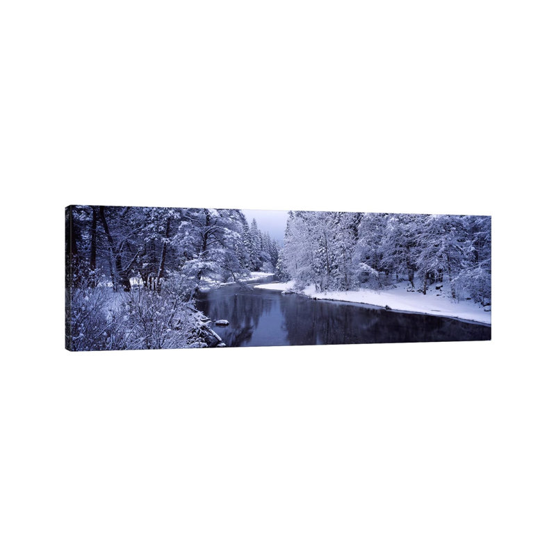 Snow Covered Trees Along A River, Yosemite National PArk, California, USA by Panoramic Images - Wrapped Canvas Panoramic Print