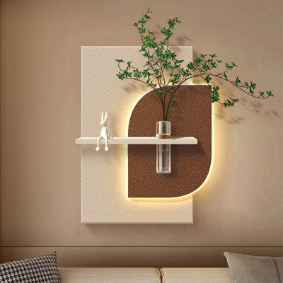 Décoration murale texturée en crème crème avec tablette à lumière DEL et vase à plante verte pour entrée