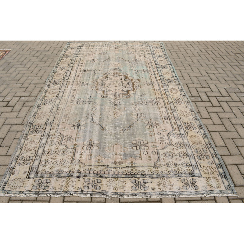 Tapis turc rétro beige et bleu à motif floral antique pour une décoration intérieure élégante