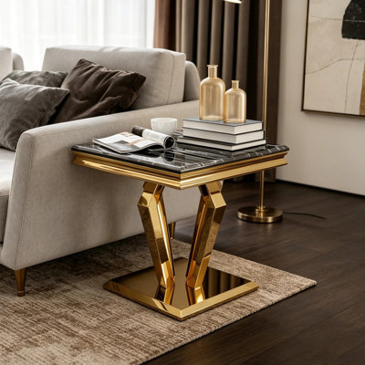 Table de bout de luxe noire et dorée avec base géométrique polie