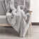 Davyn Solid Handmade Faux Fur Area Rug in Gray
